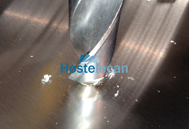 Hacer agujero de desbarasado a mesa